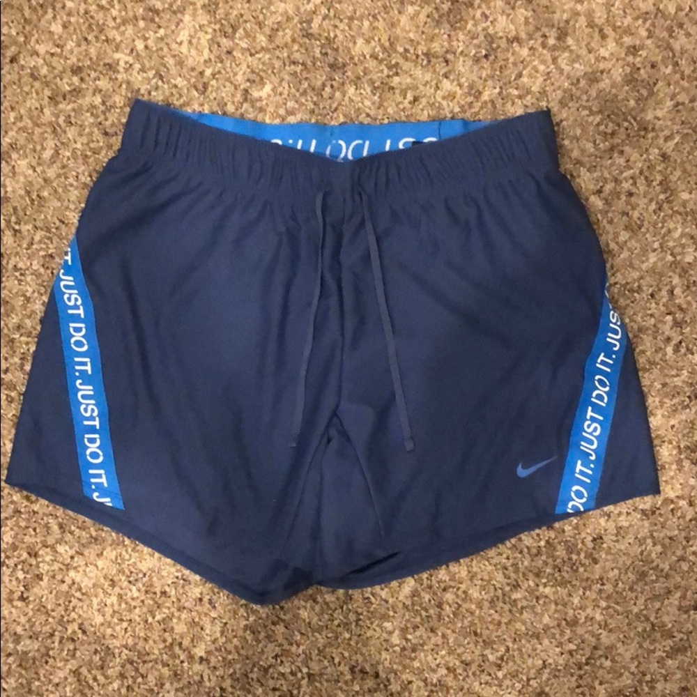 Blue Nike shorts